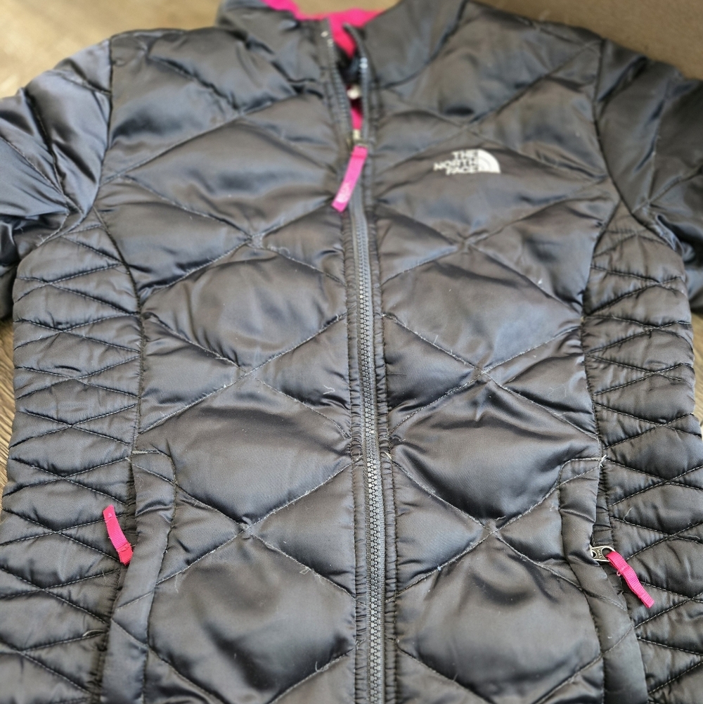The North Face Kids Puffer Jacket in Black with Pink Details